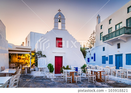 Mykonos, Greece - Cobblestone alley whitewashed village Cyclades Greek Islands 103918821