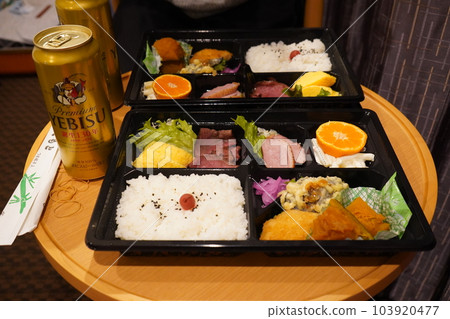 Dinner with bento and beer 103920477