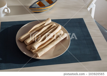 Navette de Marseille, traditional French orange flavor biscuit shaped as a boat Navette de Marseille, traditional French orange flavor biscuit shaped as a boat 103920565