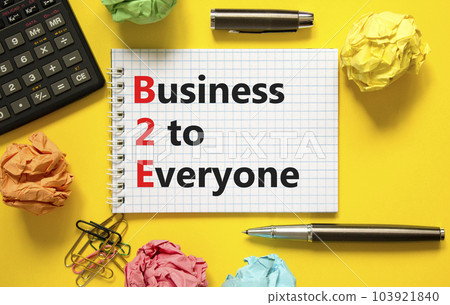 B2E business to everyone symbol. Concept words B2E business to everyone on white note on a beautiful yellow background. Calculator. Business and B2E business to everyone concept. Copy space. 103921840
