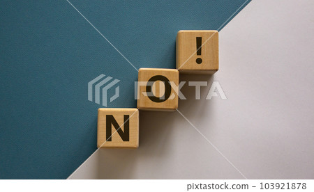 Wood blocks with word 'no' on beautiful white and blue background, copy space. Business concept. Wood blocks with word 'no' on beautiful white and blue background, copy space. Business concept. 103921878