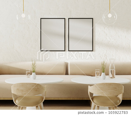 Two empty poster frames above light beige sofa in cafe with round coffee tables and chairs, 3d rendering 103922783