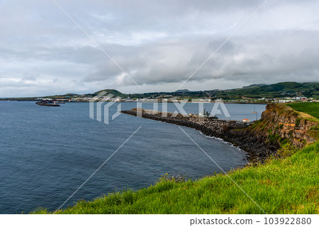 Seascape of Praia da Vitoria a sunny day of summer from Viewpoint of Facho in Terceira Island. Seascape of Praia da Vitoria a sunny day of summer from Viewpoint of Facho in Terceira Island. 103922880