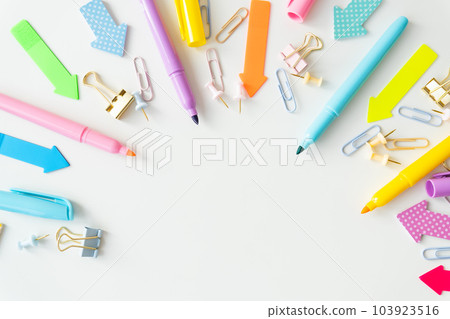 Stationery, school supplies on a white table in bright pastel colors. 103923516
