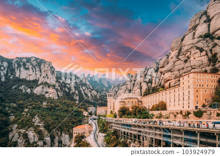 Santa Maria De Montserrat. Amazing Scenic View Colorful Sky Above Benedictine Abbey In Mountain Of Montserrat, In Monistrol De Montserrat, In Catalonia, Spain. Spirit Of Travel 103924979