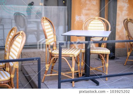 Summer terrace of the restaurant on a clear day. Table near the restaurant close-up Summer terrace of the restaurant on a clear day. Table near the restaurant close-up 103925202