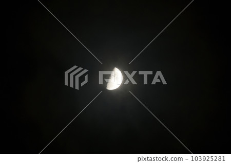 Hakushu Town, Hokuto City, Shining 8.5 first quarter moon wrapped in a veil of thin clouds Hakushu Town, Hokuto City, Shining 8.5 first quarter moon wrapped in a veil of thin clouds 103925281