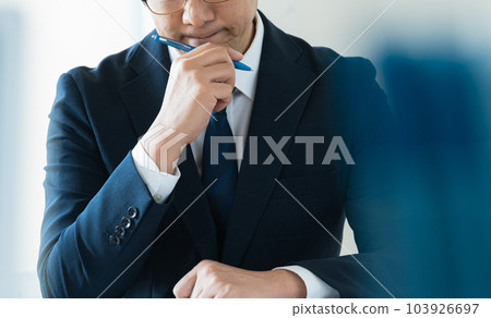 Worried businessman Worried businessman 103926697
