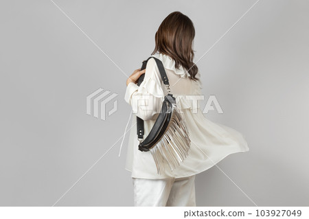Woman with Black Leather Crossbody Fanny Pack Bag Woman with Black Leather Crossbody Fanny Pack Bag 103927049