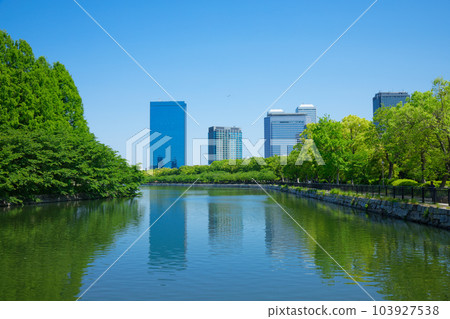 Osaka Castle Park, moat, boat, fresh green leaves, green maple leaves Osaka Castle Park, moat, boat, fresh green leaves, green maple leaves 103927538