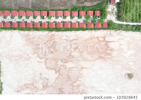Land and house in aerial view. Land and house in aerial view. 103928645
