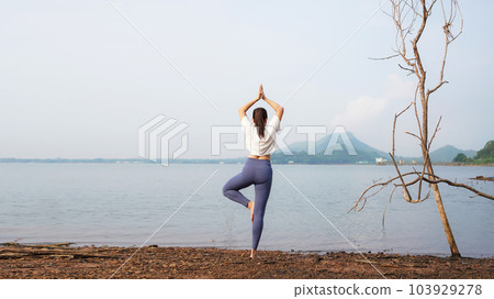 Lifestyle woman yoga exercise and pose for healthy life. Young girl or people pose balance  103929278