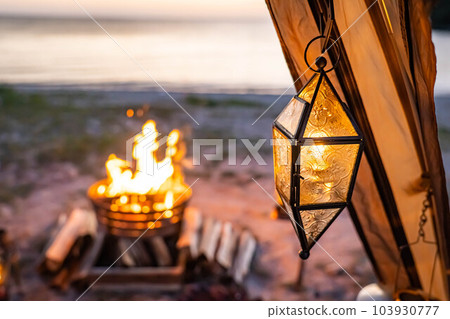 lantern lamp bonfire bonfire camping solo camping seaside coast sunset evening outdoors lantern lamp bonfire bonfire camping solo camping seaside coast sunset evening outdoors 103930777
