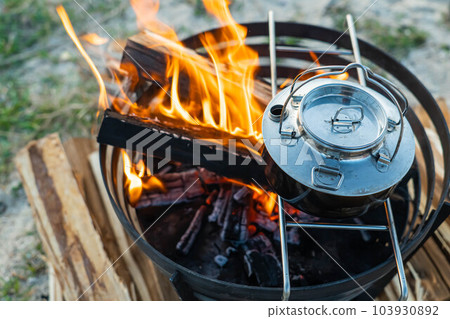 bonfire bonfire camp kettle camp camping campfire hot firewood 103930892