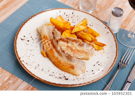 Delicious roasted pork belly with french fries Delicious roasted pork belly with french fries 103932301