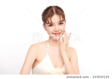 Beautiful young asian woman with clean fresh skin on white background, Face care, Facial treatment, Cosmetology, beauty and spa, Asian women portrait. Beautiful young asian woman with clean fresh skin on white background, Face care, Facial treatment, Cosmetology, beauty and spa, Asian women portrait. 103934185