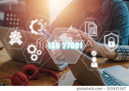 ISO 27001 Quality standards assurance business technology concept, Business team working on laptop analyzing income charts and graphs with iso 27001 icon on virtual screen. 103935167