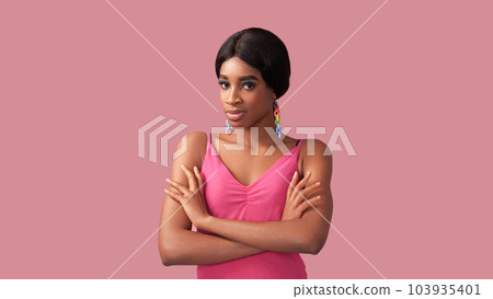Skeptic portrait. Suspicious look. Doubt disbelief. Displeased annoyed woman waiting with crossed arms isolated on pink empty space background. Skeptic portrait. Suspicious look. Doubt disbelief. Displeased annoyed woman waiting with crossed arms isolated on pink empty space background. 103935401
