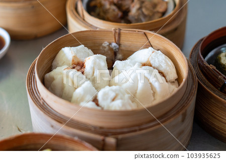 Steamed pork bun from the stove was hot. Steamed pork bun from the stove was hot. 103935625