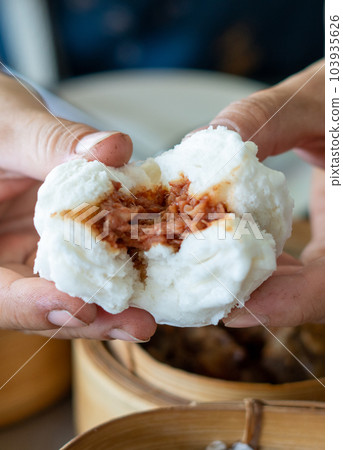 Steamed pork bun from the stove was hot. 103935626