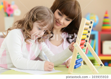 mother with little daughter 103935910