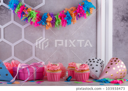 Birthday partry concept with cupcake Birthday partry concept with cupcake 103938473