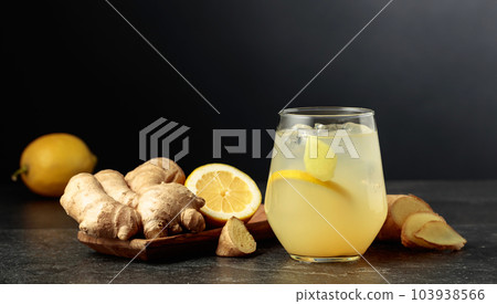 Ginger Ale with ice and lemon. 103938566