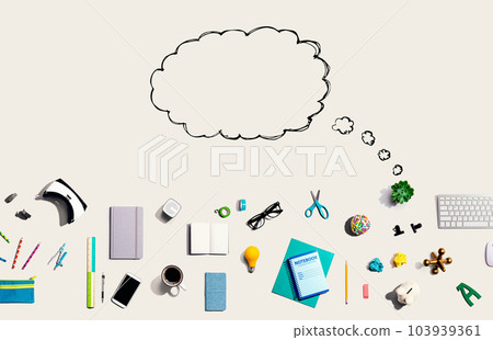 Blank speech bubble with electronic gadgets and office supplies 103939361