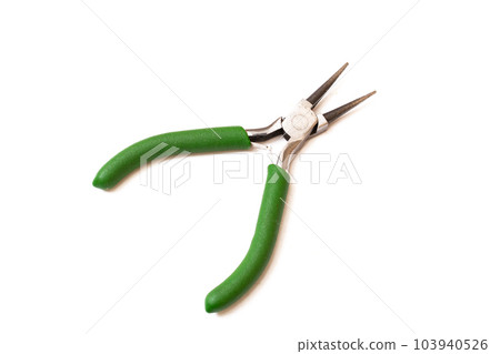 Green pliers isolated on white background closeup Green pliers isolated on white background closeup 103940526