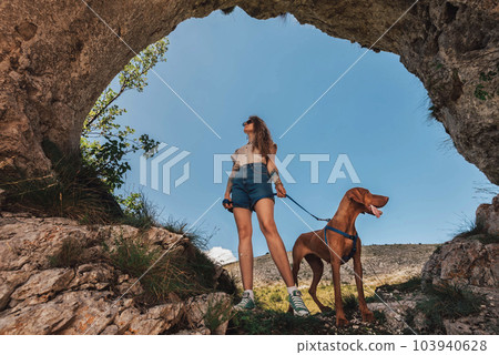 Young Woman Travel With Dog In Nature Young Woman Travel With Dog In Nature 103940628