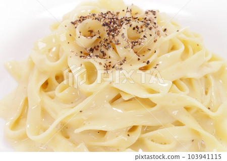 Creamy carbonara, wide noodles, simple pasta, bright background Creamy carbonara, wide noodles, simple pasta, bright background 103941115
