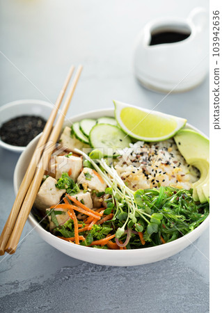 Poke bowl with silken tofu, rice and vegetables Poke bowl with silken tofu, rice and vegetables 103942636