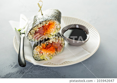 Sushi or poke burrito with nori Sushi or poke burrito with nori 103942647