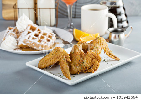 French toast waffles with fried chicken French toast waffles with fried chicken 103942664