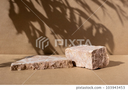 Podium with dry grass for product promotion and cosmetics display. Natural beige beauty pedestal. Background for product presentation. Cream stone podiums with shadow of leaf. Beauty product mockup Podium with dry grass for product promotion and cosmetics display. Natural beige beauty pedestal. Background for product presentation. Cream stone podiums with shadow of leaf. Beauty product mockup 103943453