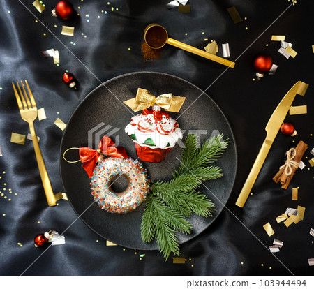 Creative photo of Christmas tree toys of unusual design. Creative photo of Christmas tree toys of unusual design. 103944494