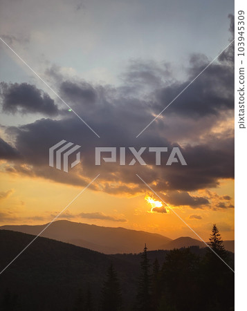 colorful sunset on top of ukrainian mountain 103945309