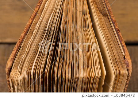 Detail of pages of an old book Detail of pages of an old book 103946478