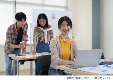 Team of ux developer and ui designer brainstorming interface wireframe design.Creative digital development agency 103947254