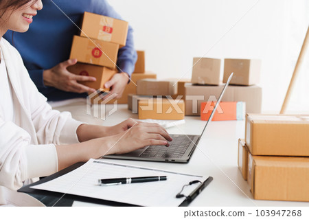 Small business owners couple entrepreneurs working with parcel, e-business, marketing, online shop, sme, entrepreneurs Small business owners couple entrepreneurs working with parcel, e-business, marketing, online shop, sme, entrepreneurs 103947268