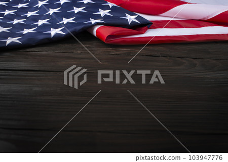 US flag on wooden background with copyspace US flag on wooden background with copyspace 103947776