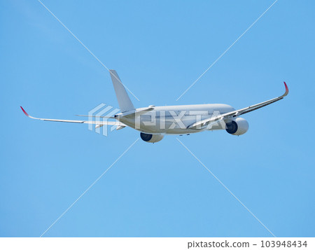 Obliquely backward material of an airplane flying into the sky 103948434