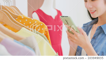 asia female choose clothes boutique asia female choose clothes boutique 103949035