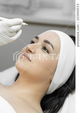 A step towards the ideal of butolinotherapy as a step towards achieving the perfect image, giving flawless skin, youth and self-confidence. Rejuvenation in a beauty salon at a cosmetologist A step towards the ideal of butolinotherapy as a step towards achieving the perfect image, giving flawless skin, youth and self-confidence. Rejuvenation in a beauty salon at a cosmetologist 103949553