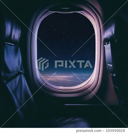 Looking out of the window of the plane, sitting in the cabin,night sky  103950028