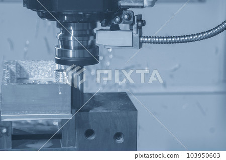 The CNC milling machine rough cutting the aluminum housing with flat end mill tool. 103950603