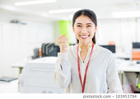 young woman standing in the office 103953784