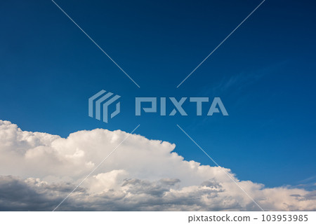 Overview of a beautiful blue sky covered with clouds. Nature. 103953985