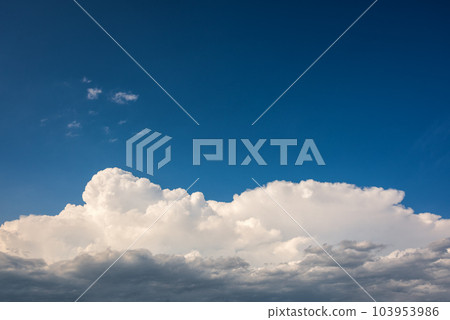 Overview of a beautiful blue sky covered with clouds. Nature. Overview of a beautiful blue sky covered with clouds. Nature. 103953986