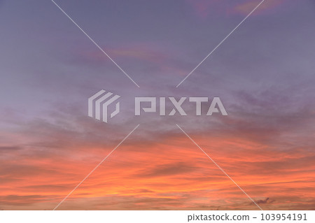 Sky light after sunset. orange background, clouds Sky light after sunset. orange background, clouds 103954191